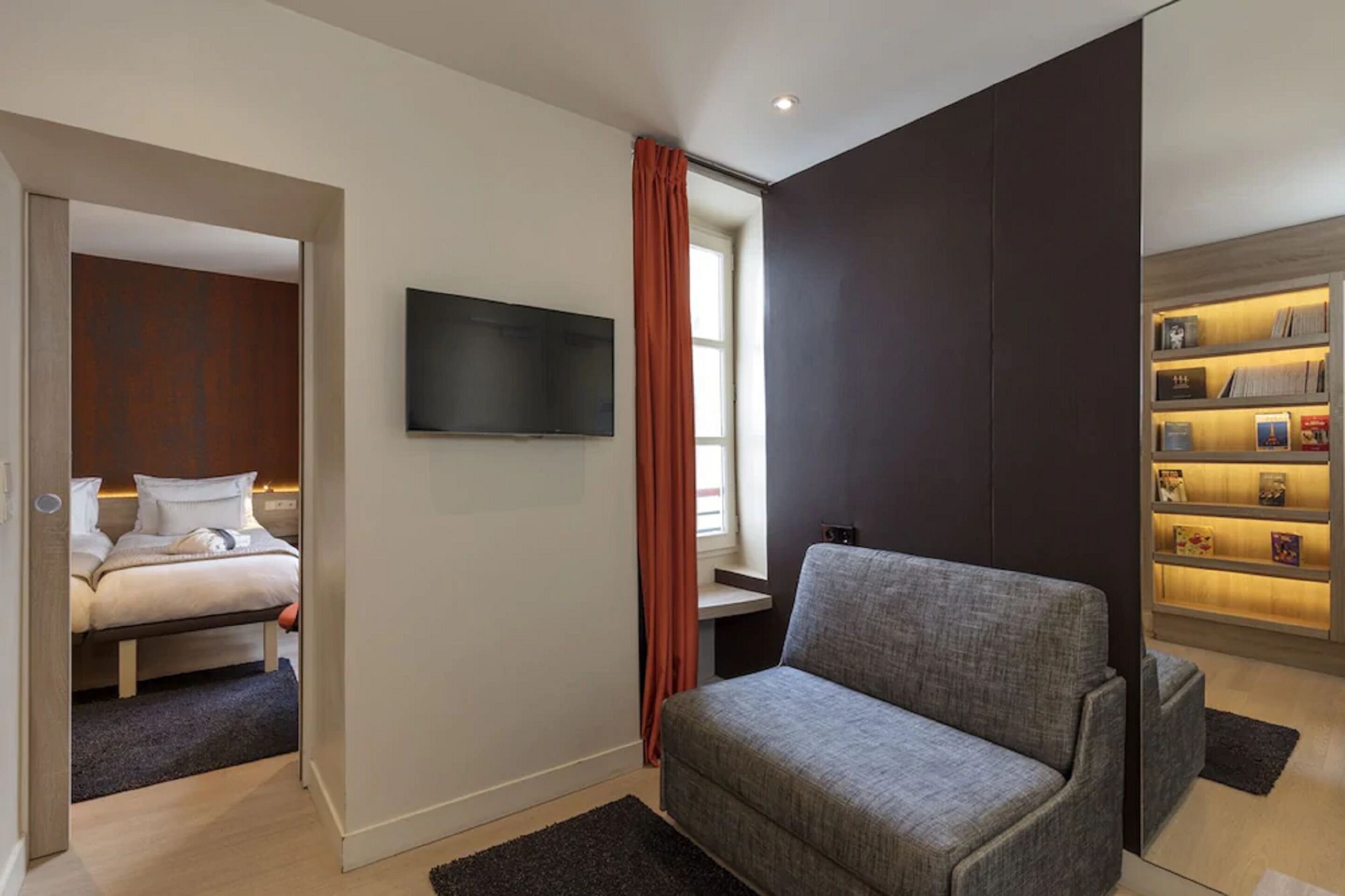 junior suite, for 3 people | living area | 37-inch plasma tv with cable channels, tv, streaming services