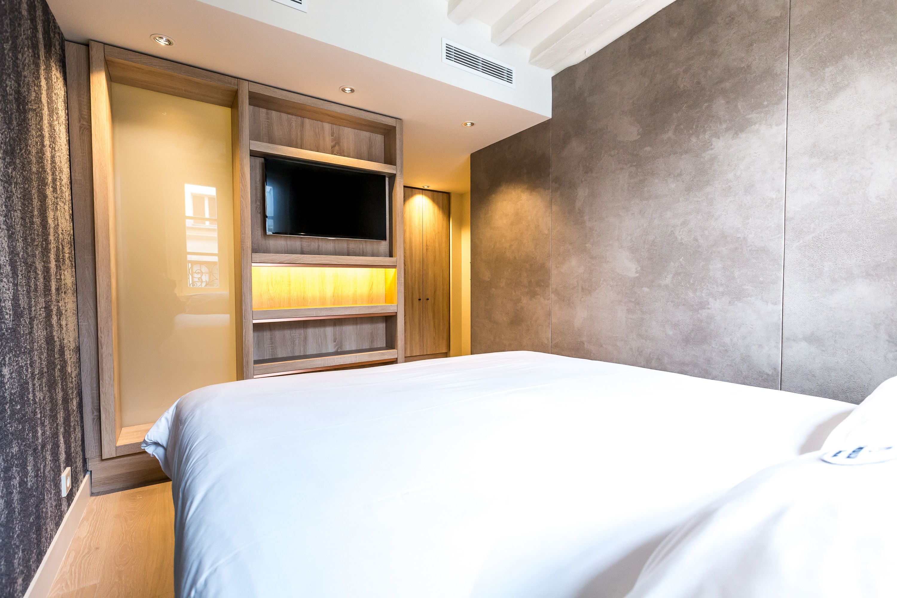 deluxe double room | premium bedding, minibar, in-room safe, individually decorated