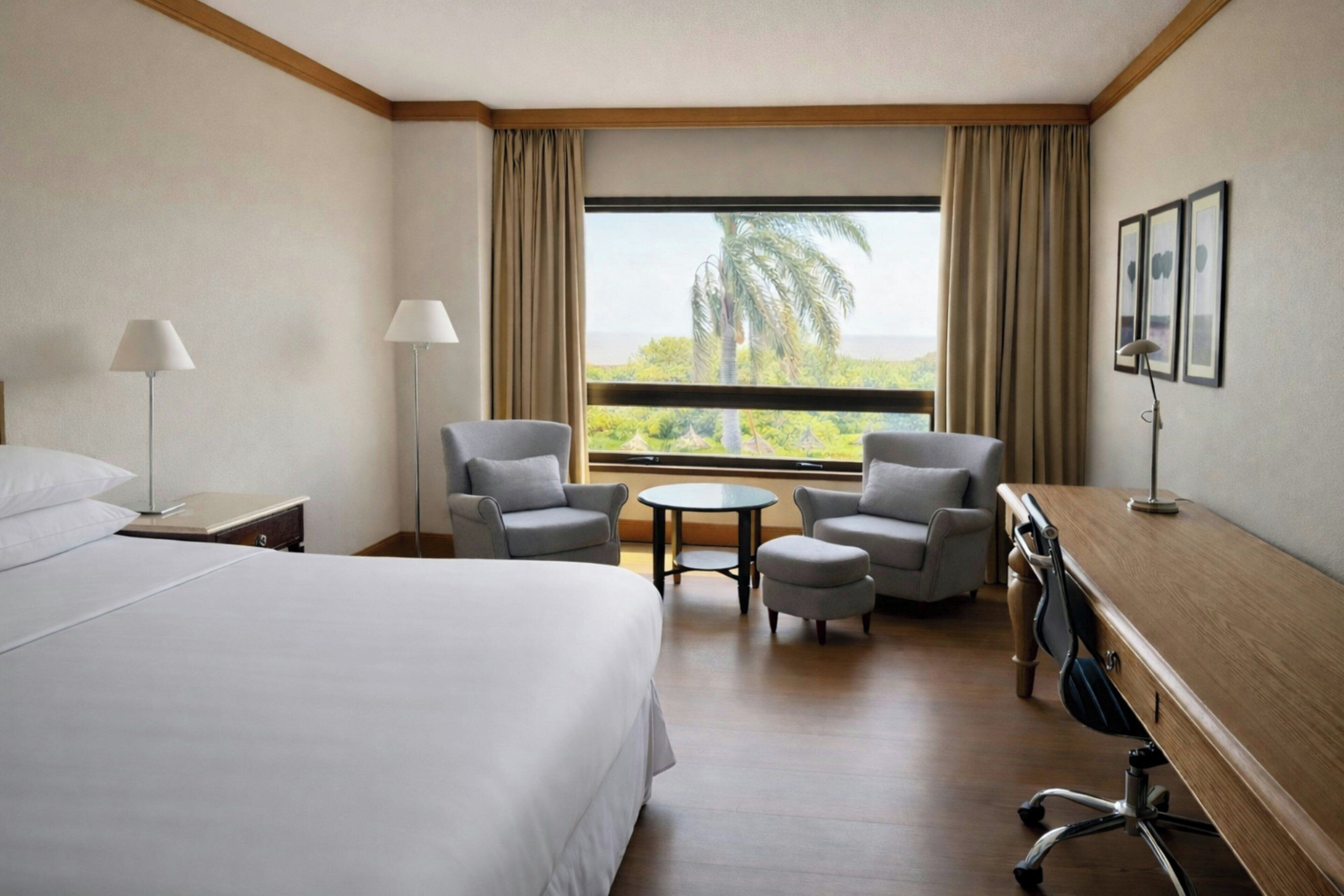 Habitación clásica, 1 cama King size, vista al río | Ropa de cama de alta calidad, camas Select Comfort y minibar 