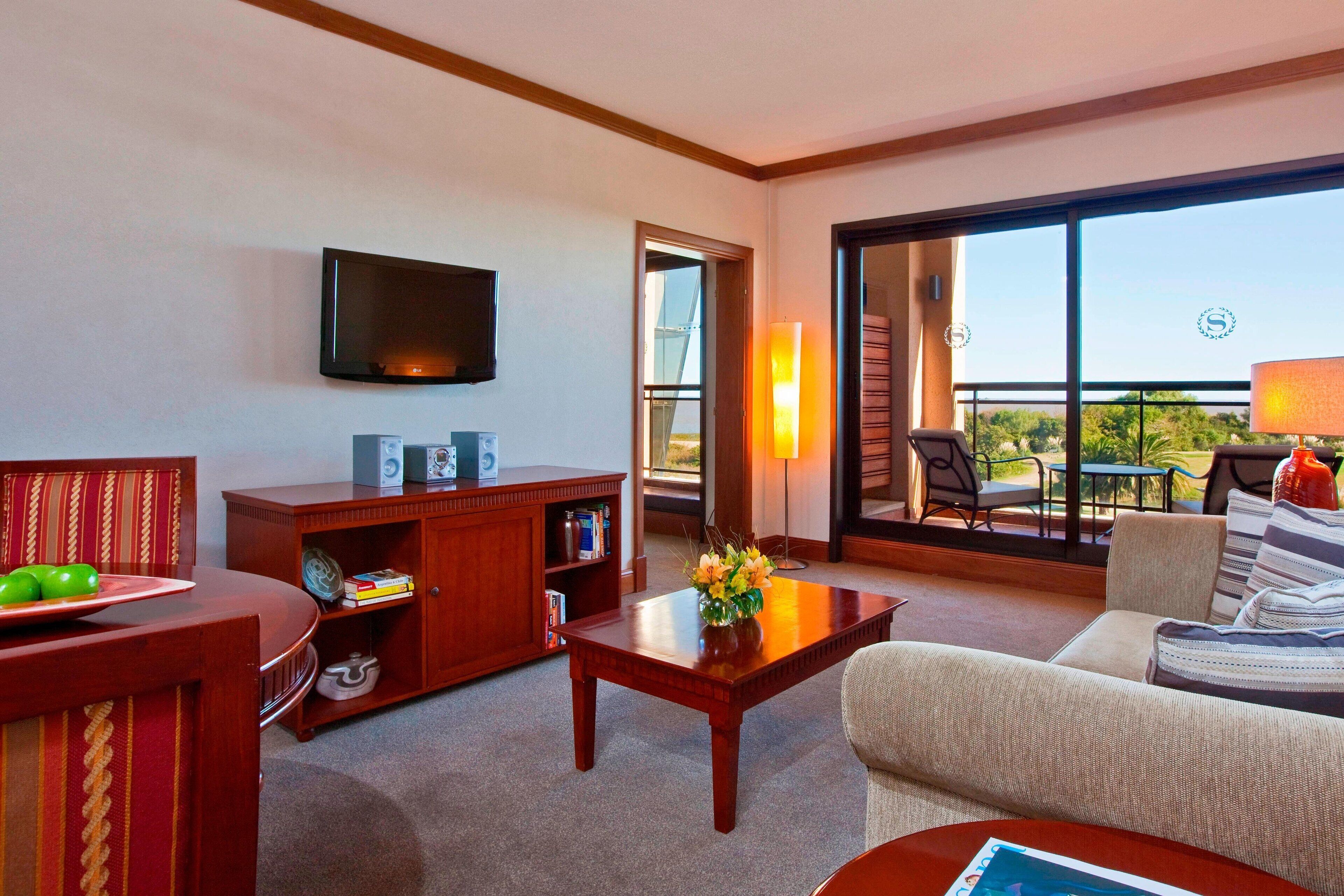 junior suite, 1 king bed, balcony, river view | premium bedding, select comfort beds, minibar, in-room safe