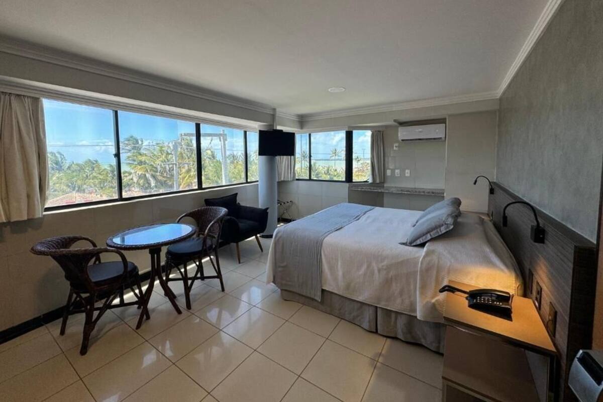 Luxo Frente Mar | Roupas de cama premium, frigobar, cofres nos quartos, Wi-Fi de cortesia