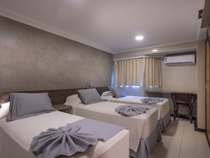 Roupas de cama premium, frigobar, cofres nos quartos, Wi-Fi de cortesia