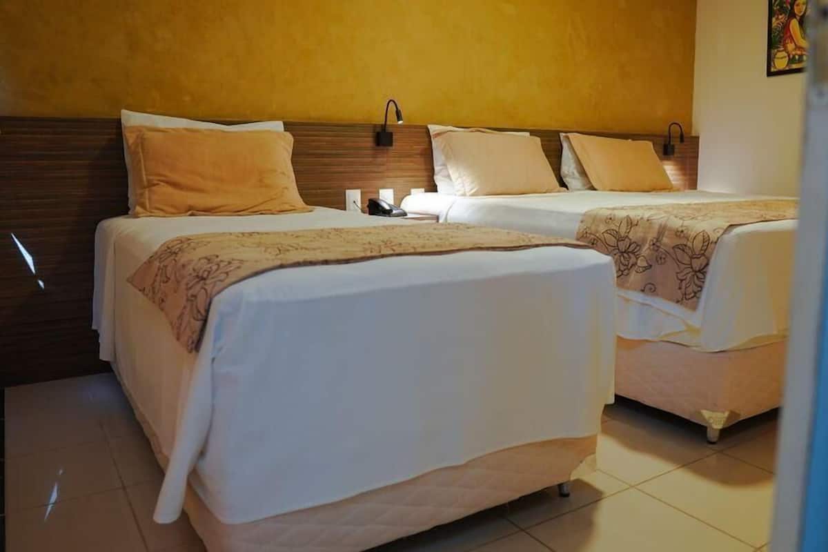 Roupas de cama premium, frigobar, cofres nos quartos, Wi-Fi de cortesia
