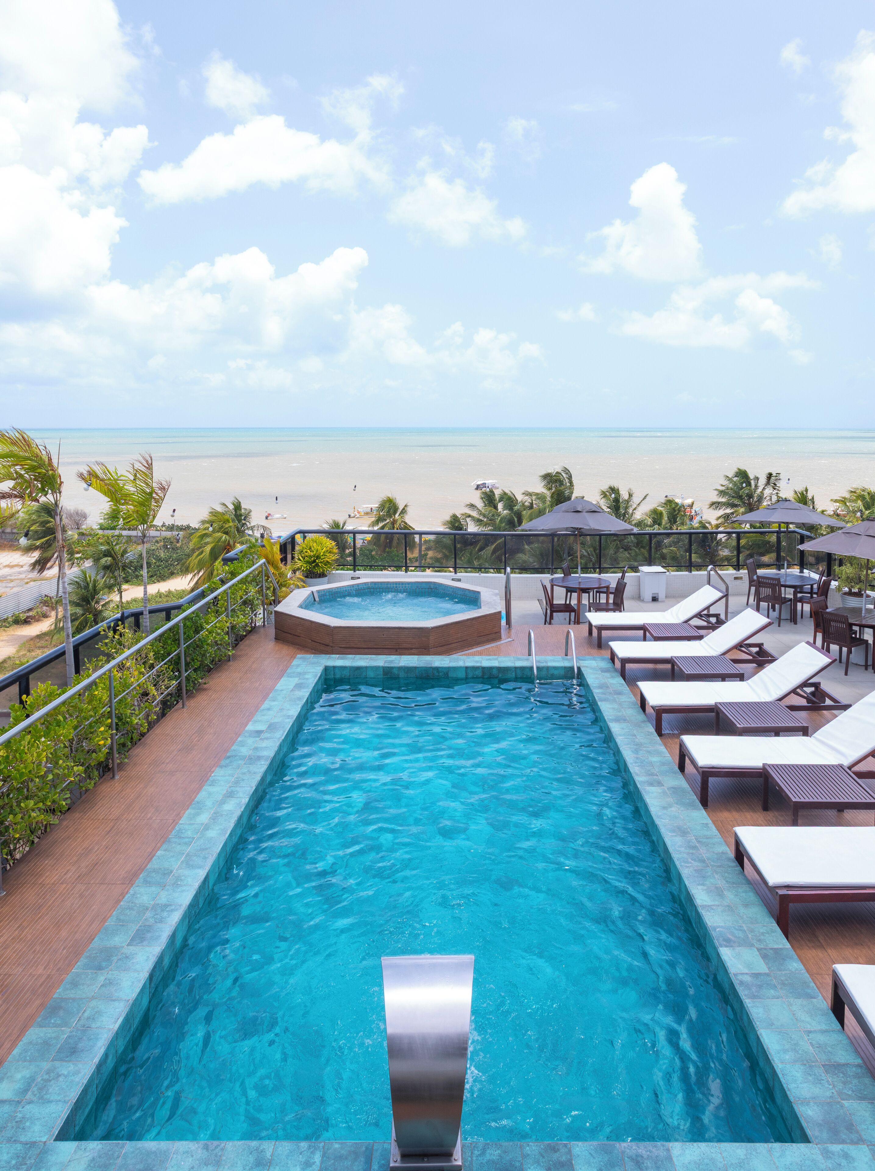 Outdoor pool, pool umbrellas, pool loungers