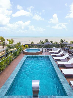 Outdoor pool, pool umbrellas, pool loungers