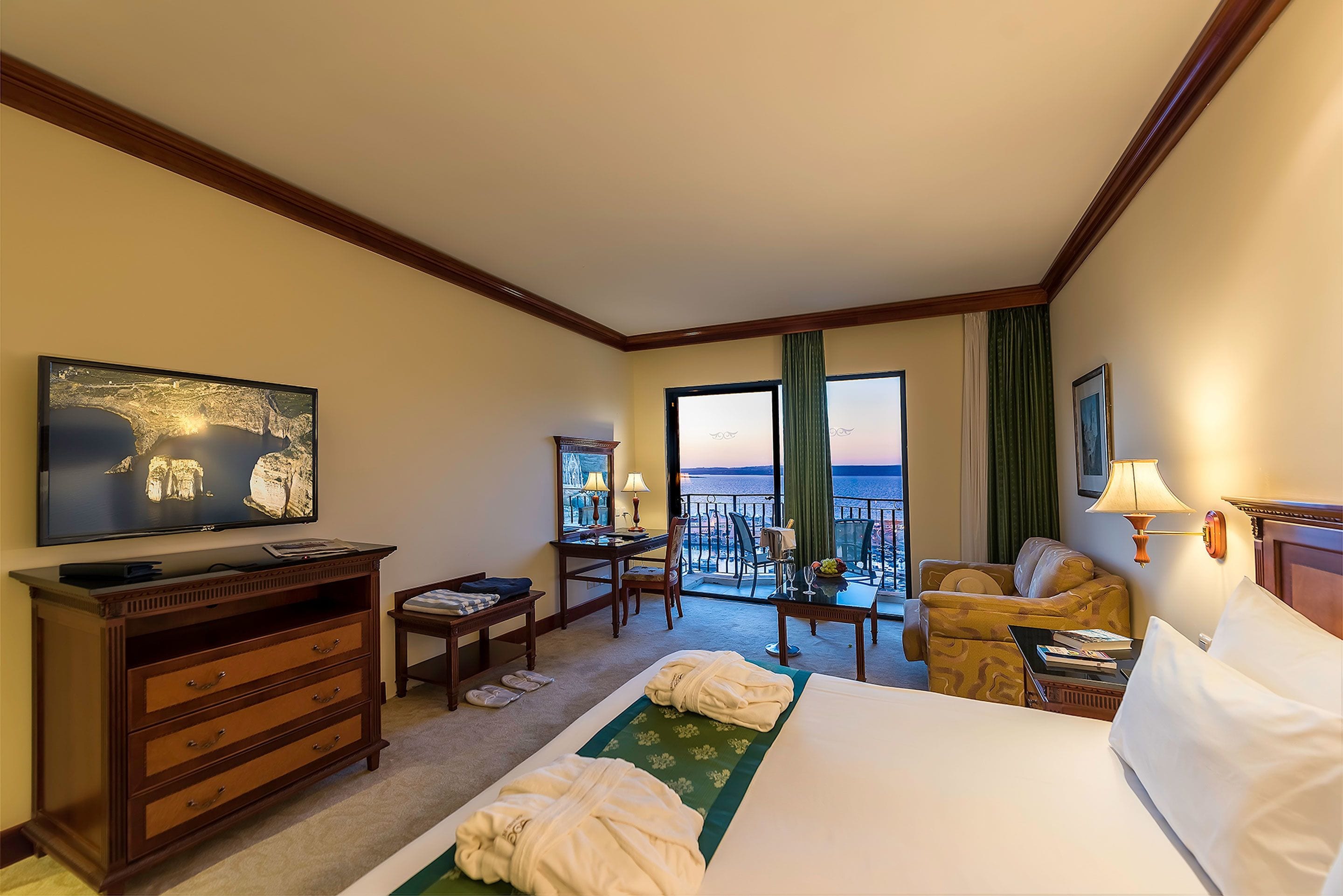 superior room, balcony, sea view | minibar, in-room safe, desk, blackout curtains