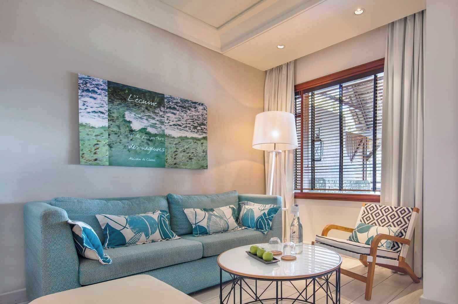 junior suite | living area | 40-inch tv with satellite channels, ipod dock, pay films