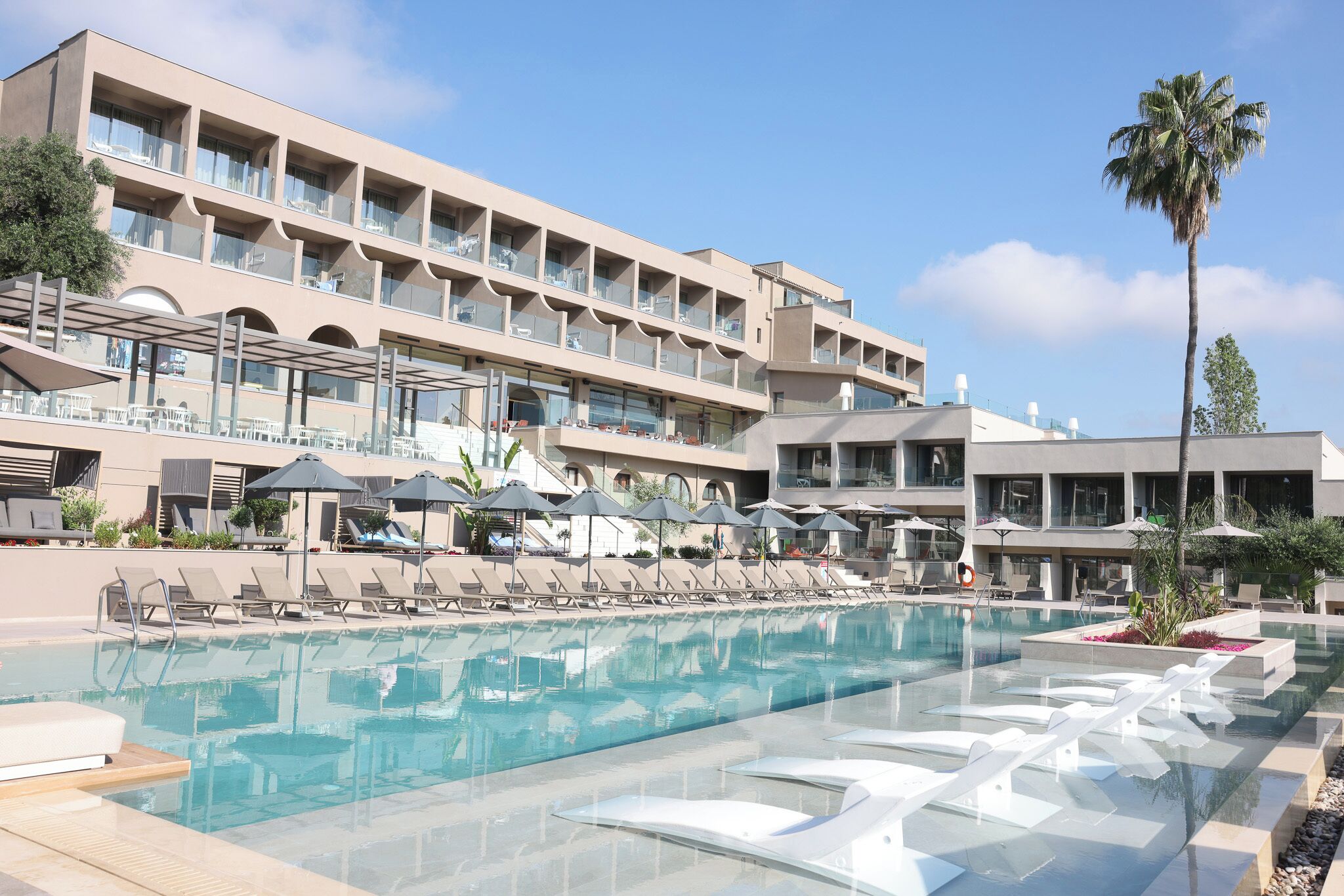 Outdoor pool, pool umbrellas, pool loungers