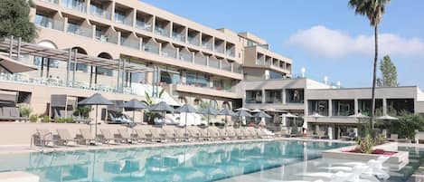 Outdoor pool, pool umbrellas, pool loungers