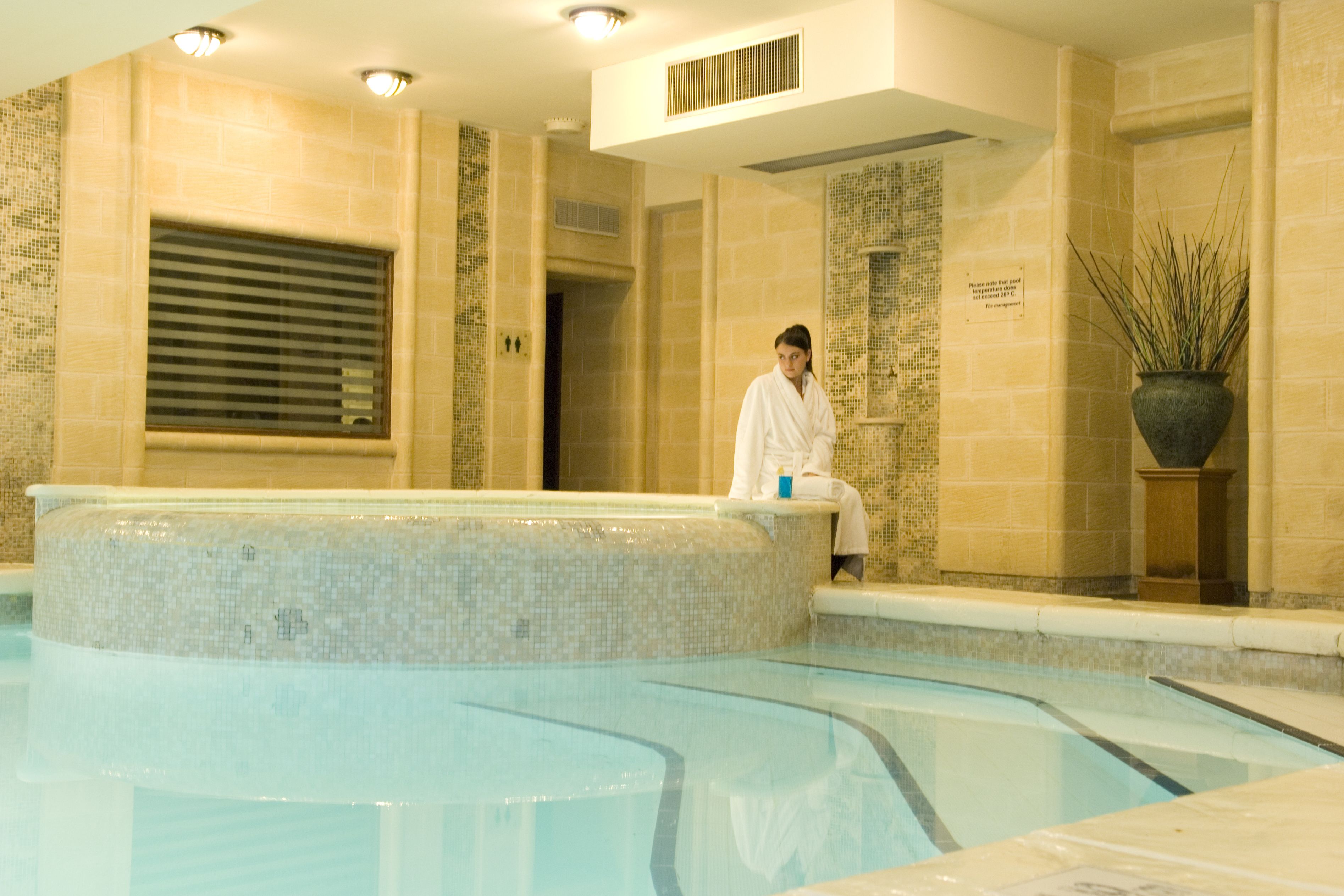 Seasonal outdoor pool, open 8:00 AM to 7:00 PM, pool umbrellas