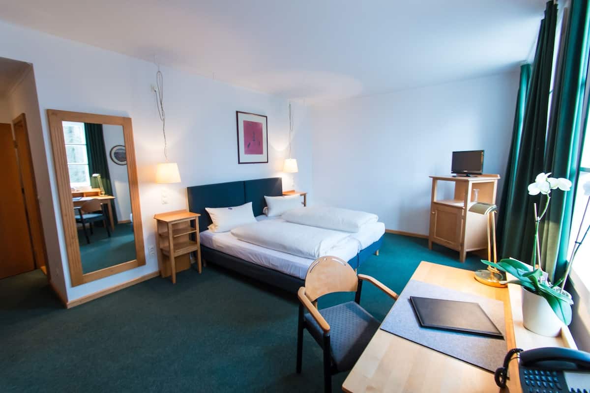 classic double room, 1 king bed, non smoking | desk, iron/ironing board, free cots/infant beds, rollaway beds