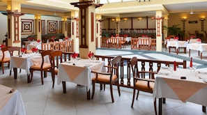 Breakfast, lunch, dinner served; local cuisine, pool views