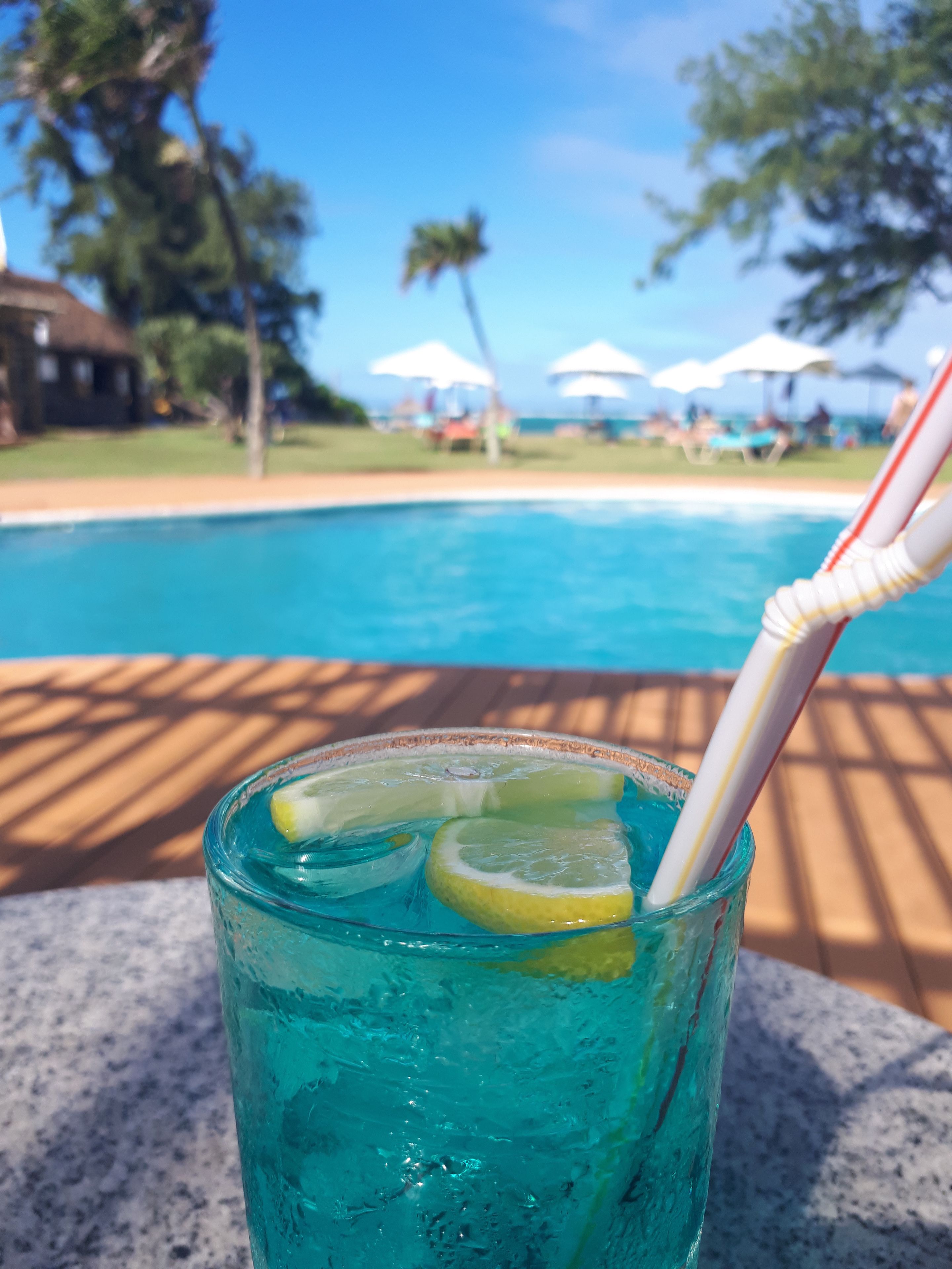 outdoor pool, pool umbrellas, pool loungers