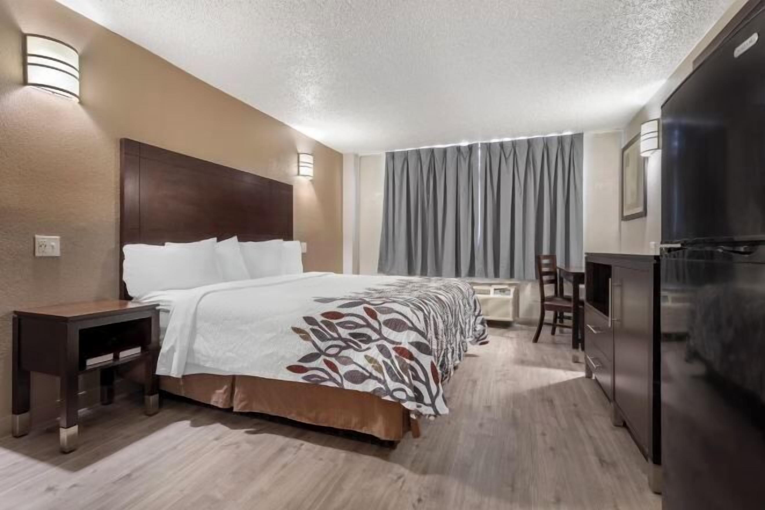 In-room safe, desk, blackout curtains, iron/ironing board