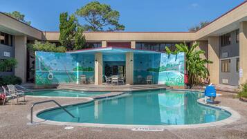 Outdoor pool, open 11:00 AM to 10:00 PM, pool umbrellas