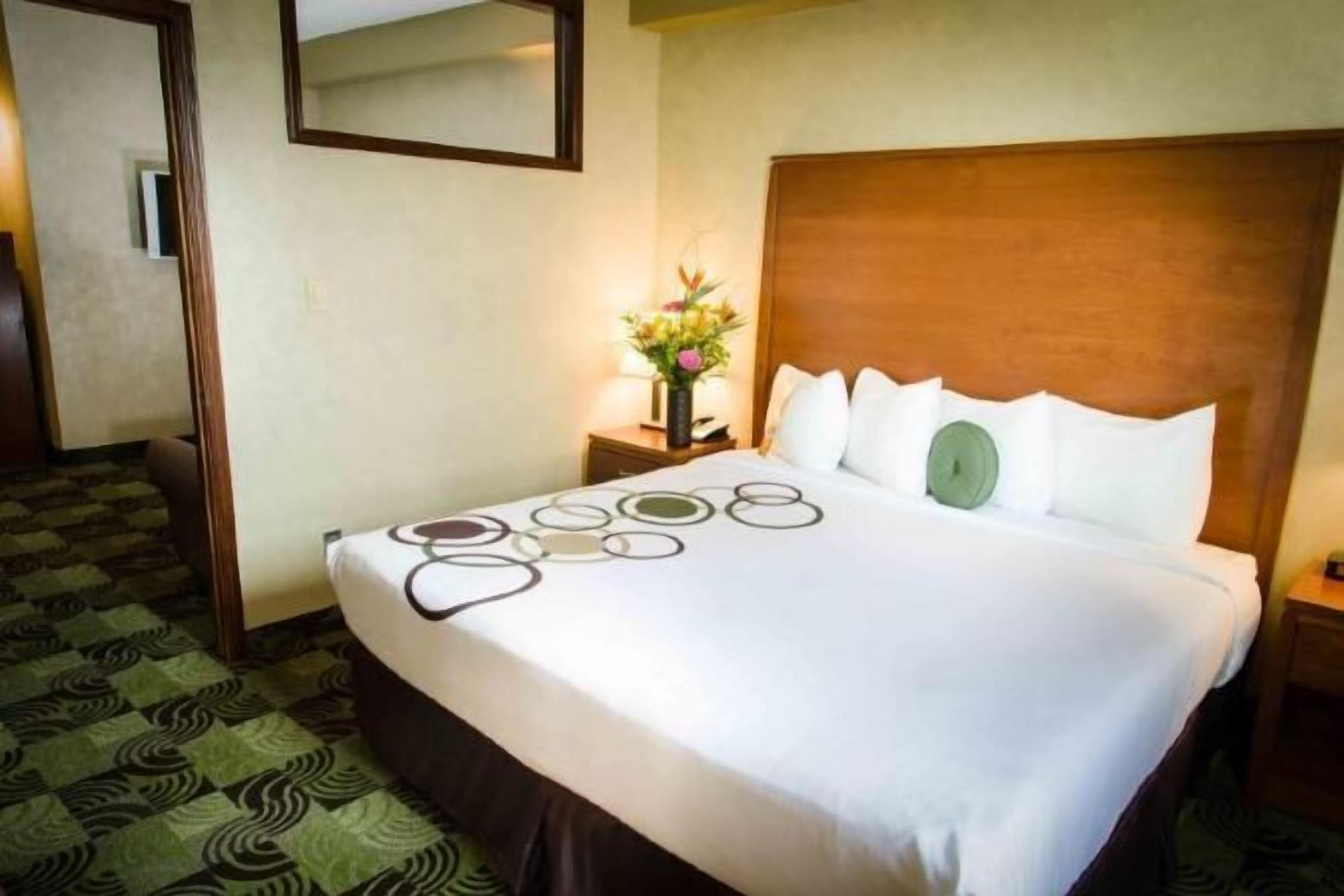 Premium bedding, down comforters, pillowtop beds, individually decorated