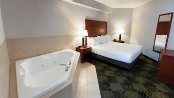 Business Suite, 1 King Bed with Sofa bed, Jetted Tub | Premium bedding, down duvets, pillow-top beds, individually decorated