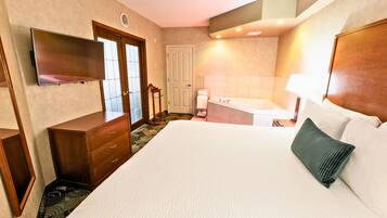 Business-Suite, 1 King-Bett und Schlafsofa, Whirlpool | Hochwertige Bettwaren, Daunenbettdecken, Pillowtop-Betten