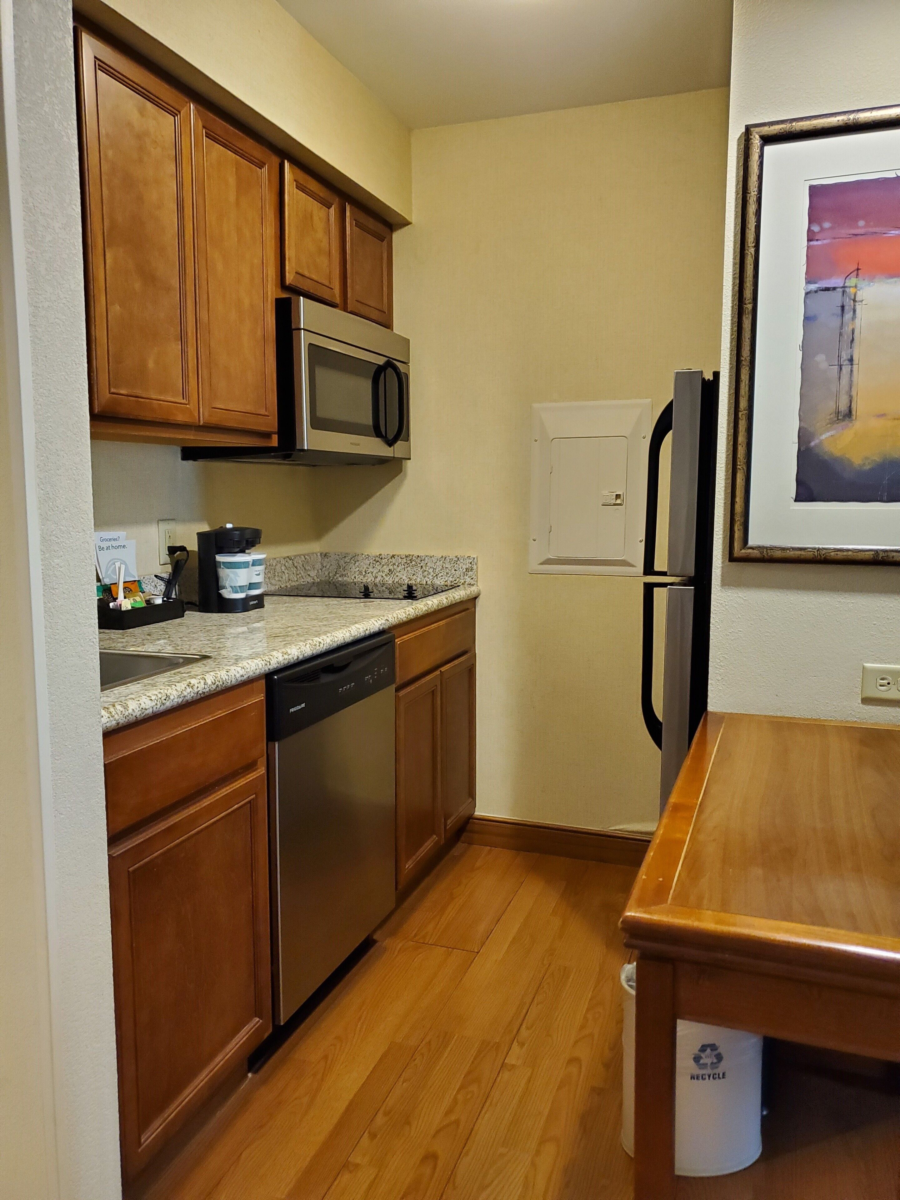 fridge, microwave, coffee/tea maker, cookware/dishes/utensils