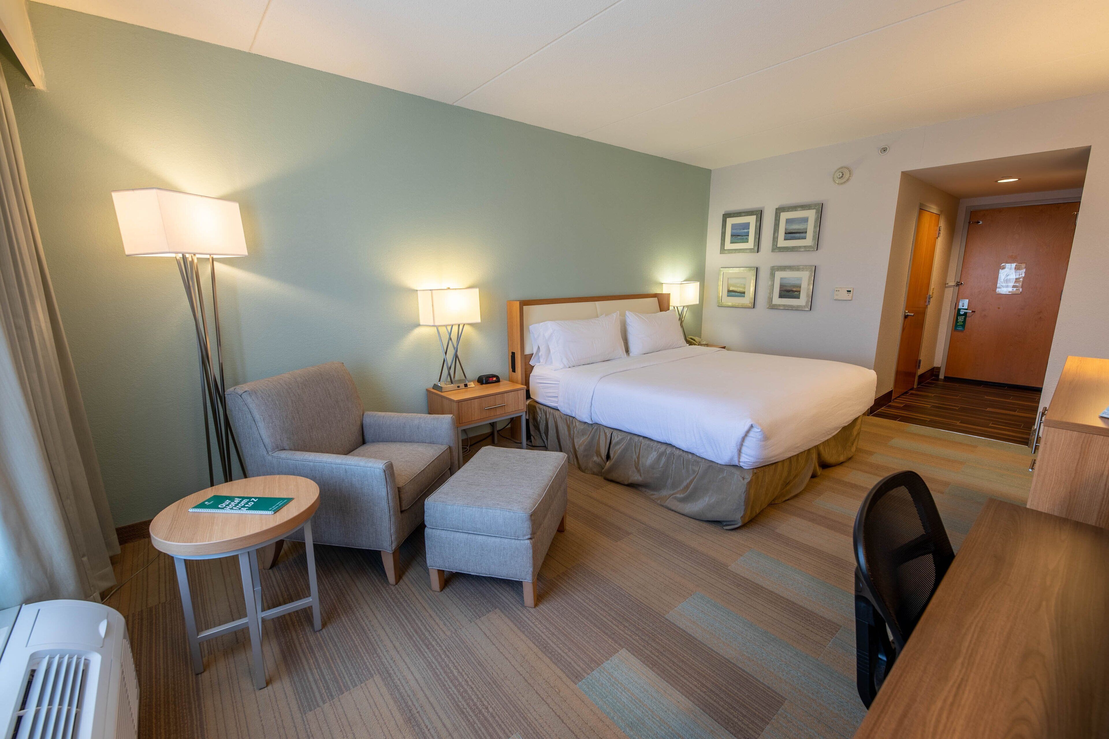 Premium bedding, memory foam beds, desk, laptop workspace