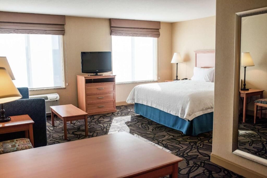 Desk, blackout drapes, iron/ironing board, rollaway beds