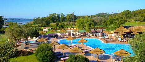 Seasonal outdoor pool, pool umbrellas, sun loungers