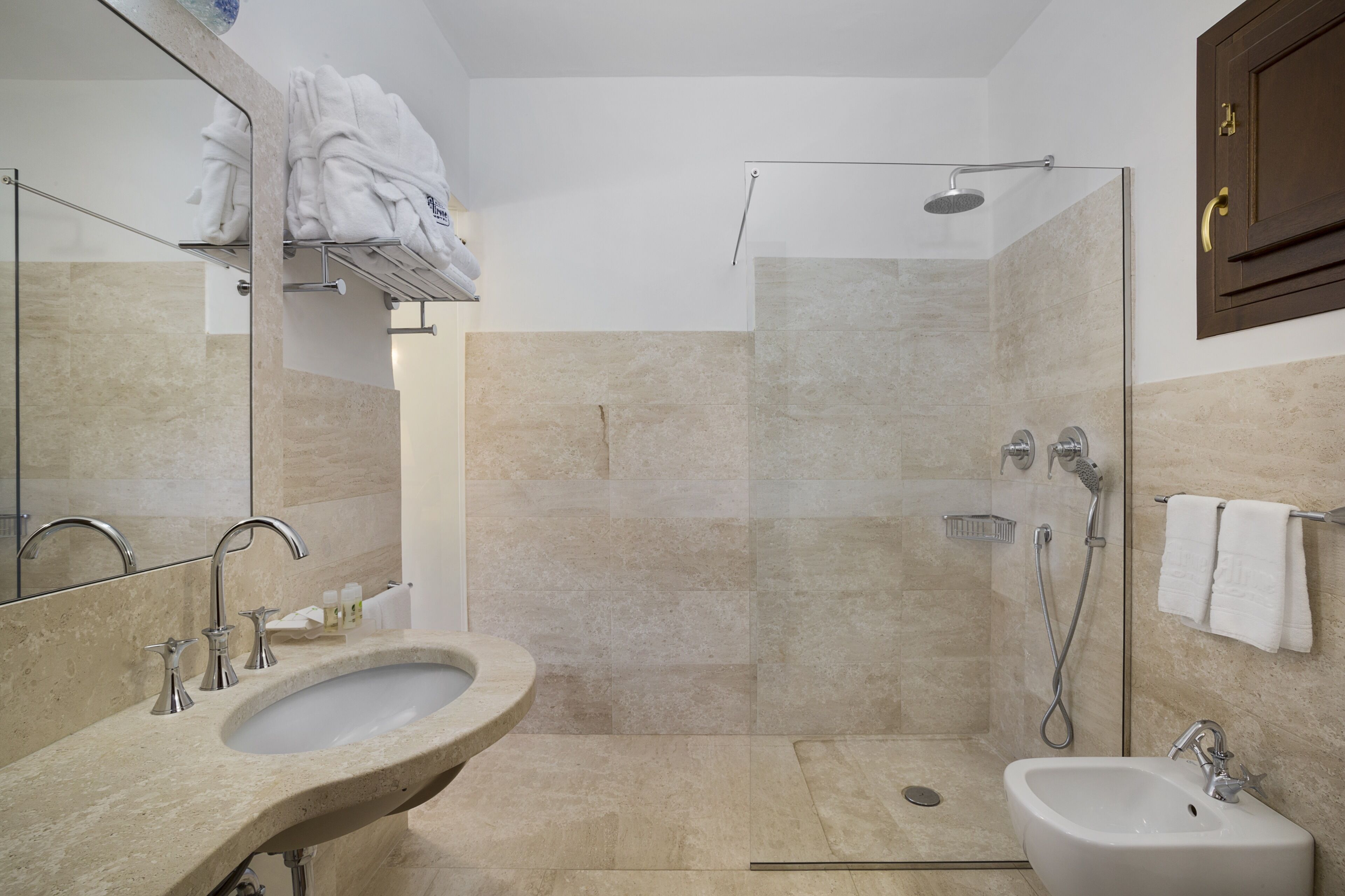 deluxe room | bathroom | shower, free toiletries, hair dryer, bidet