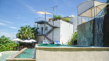 3 outdoor pools, open 7:00 AM to 10:00 PM, pool umbrellas, pool loungers