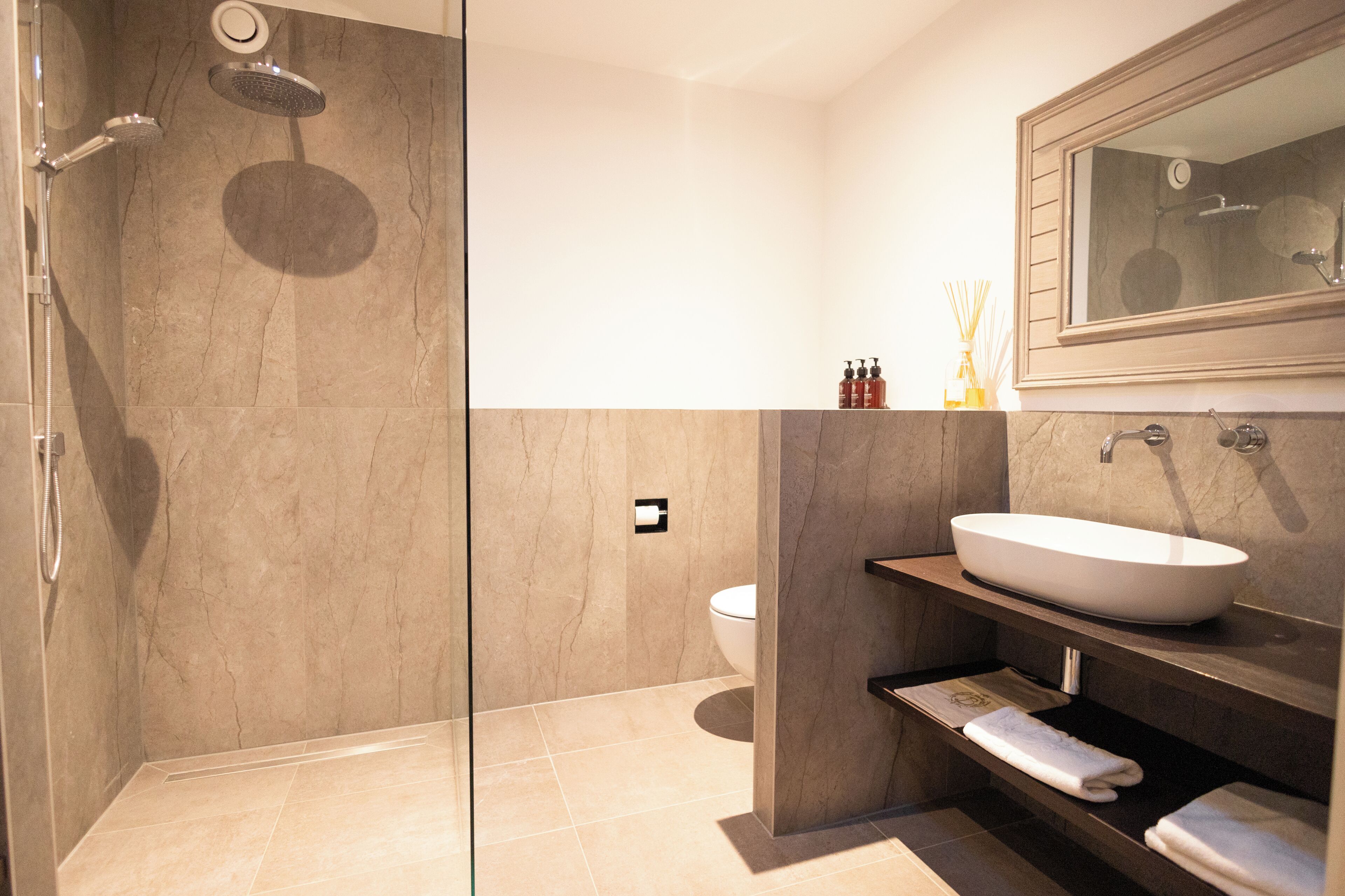 comfort room | bathroom | free toiletries, hair dryer, bathrobes, slippers