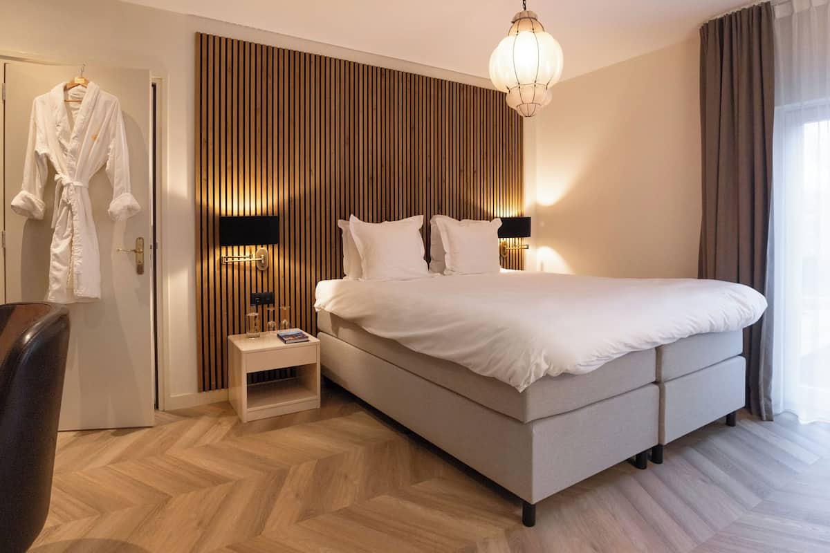 1 Schlafzimmer, hochwertige Bettwaren, Minibar, Zimmersafe