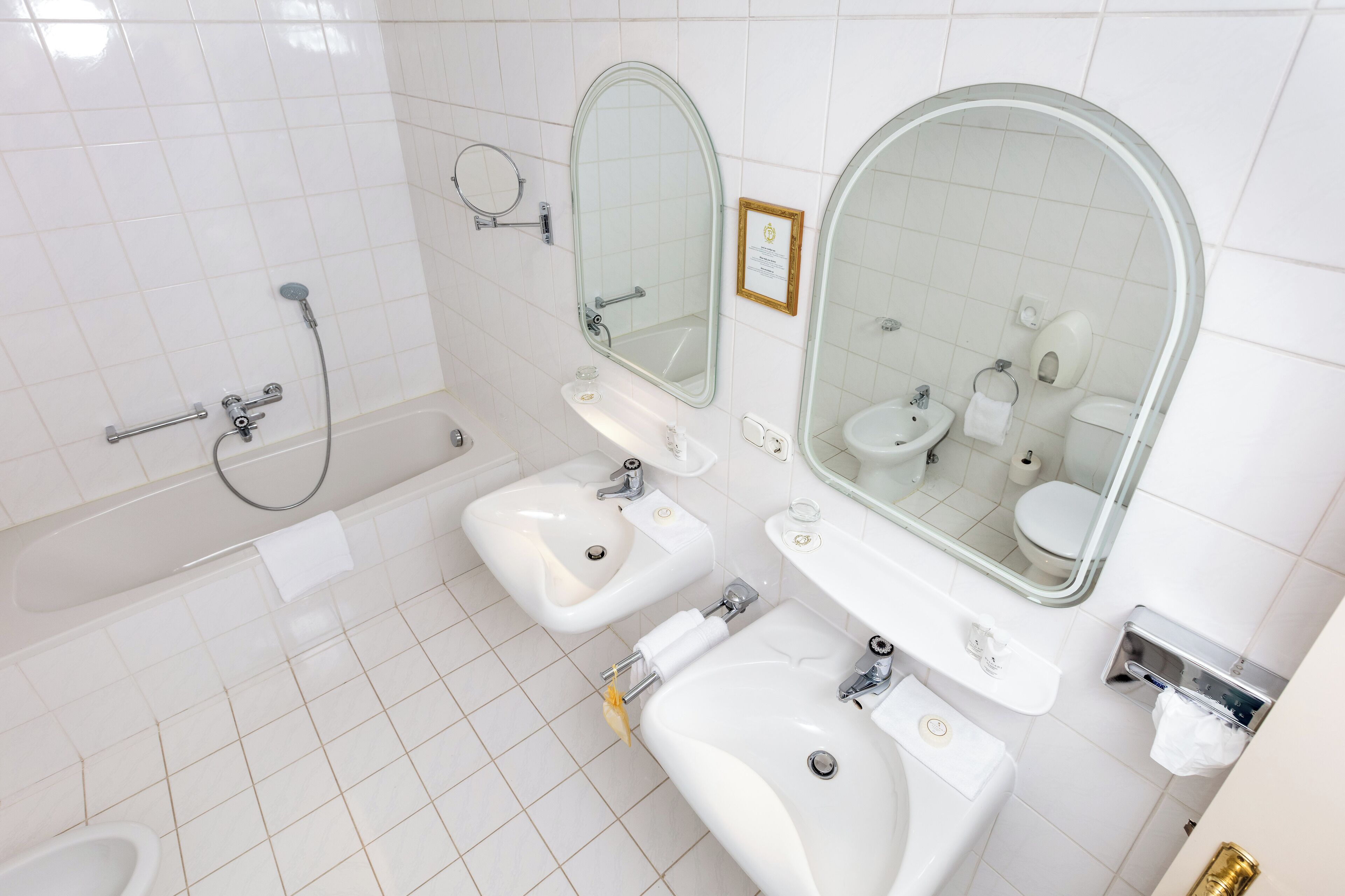 grand suite (split level) | bathroom | free toiletries, hair dryer, bathrobes, slippers