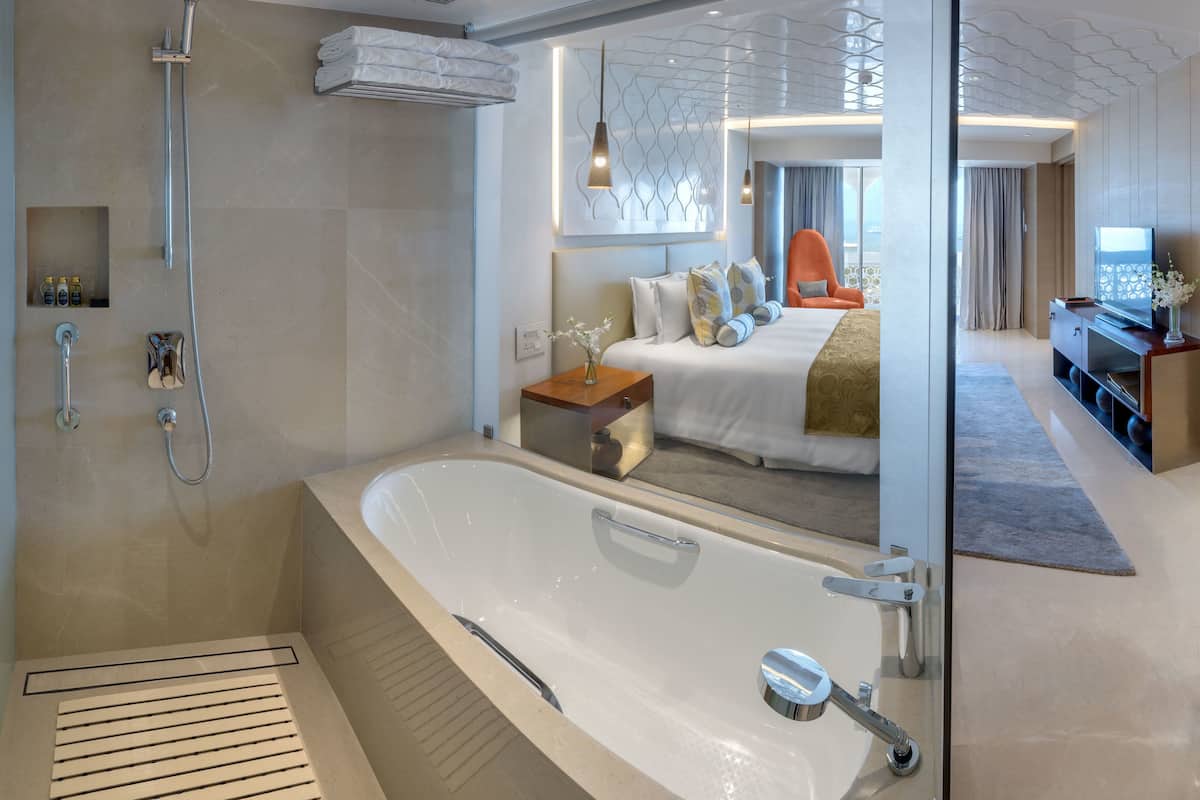 suite, 1 king bed, sea view | bathroom | shower, designer toiletries, hair dryer, bathrobes