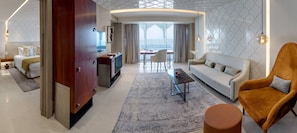 Suite, 1 King Bed, Sea View | Living area