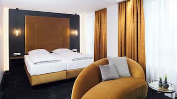 Junior-Studiosuite | 1 Schlafzimmer, Minibar, Zimmersafe, schallisolierte Zimmer