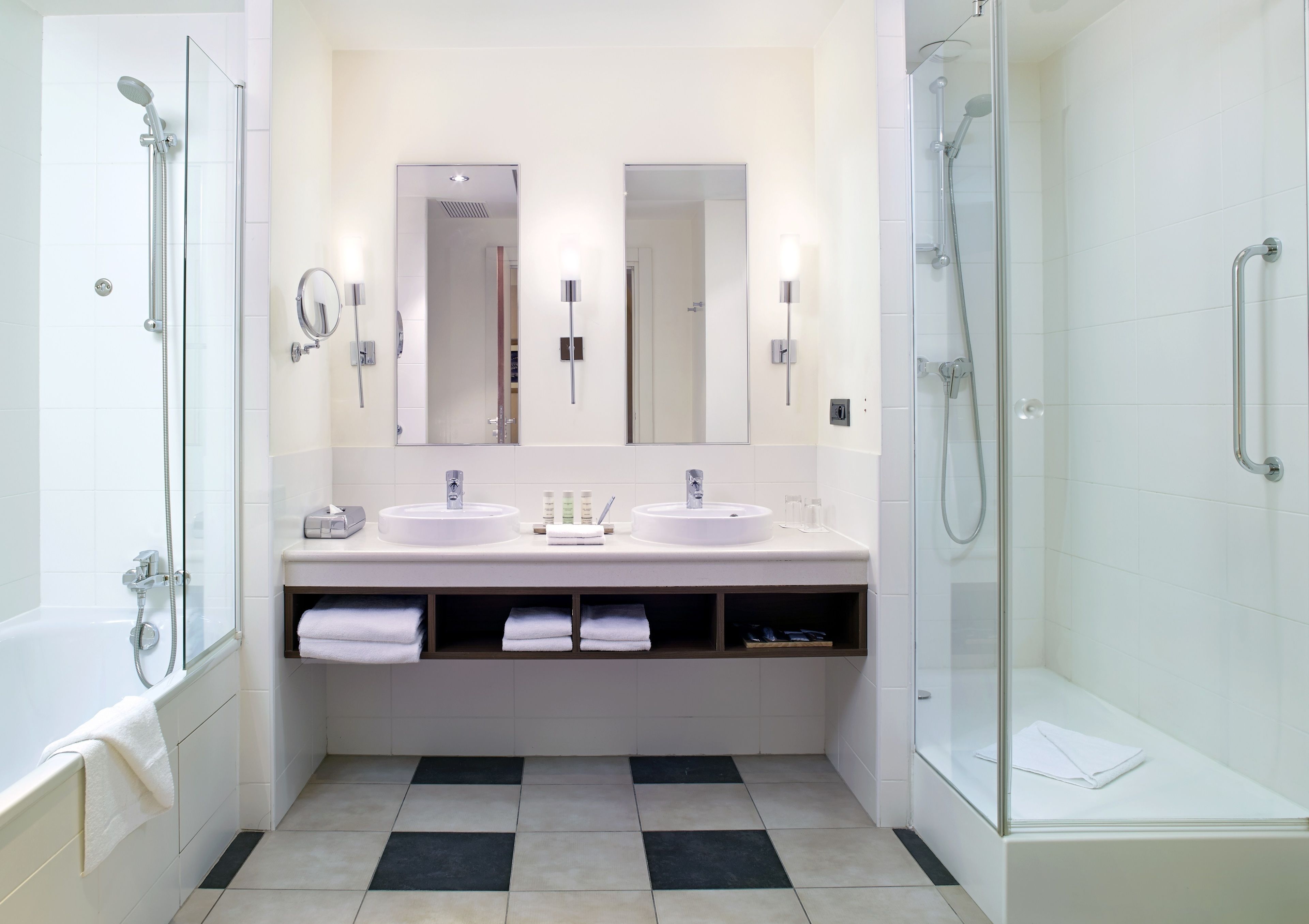 designer toiletries, hair dryer, towels, soap