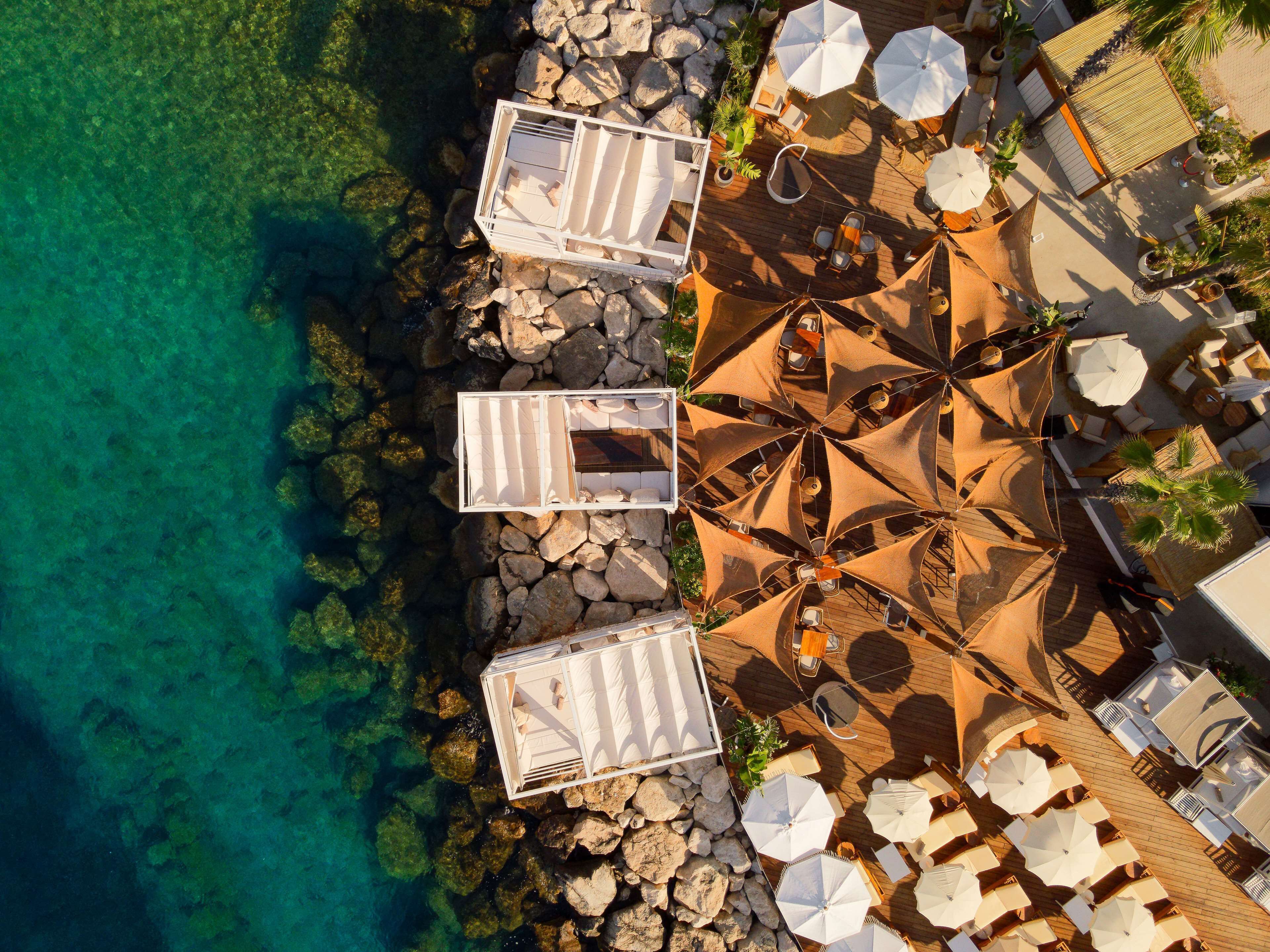 Beach nearby, white sand, beach cabanas, sun loungers