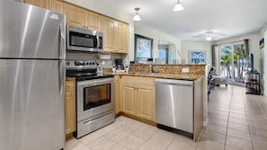 Deluxe Condo, Balcony (Gulf Front) | Private kitchen | Full-size fridge, microwave, oven, coffee/tea maker