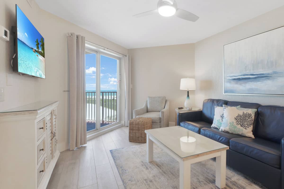 Premium Condo, Balcony, Ocean View (Gulf Front) | Living area | Flat-screen TV, DVD player