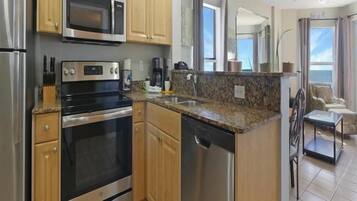 Deluxe Condo, Balcony (Gulf Front) | Private kitchen | Full-size fridge, microwave, oven, coffee/tea maker