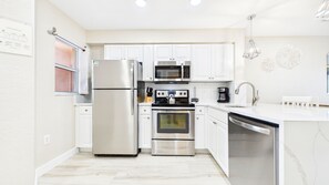 Premium Condo, Balcony, Ocean View (Gulf Front) | Private kitchen | Full-size fridge, microwave, oven, coffee/tea maker