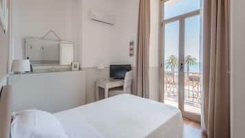 Single Room, Sea View | Down comforters, minibar, in-room safe, desk