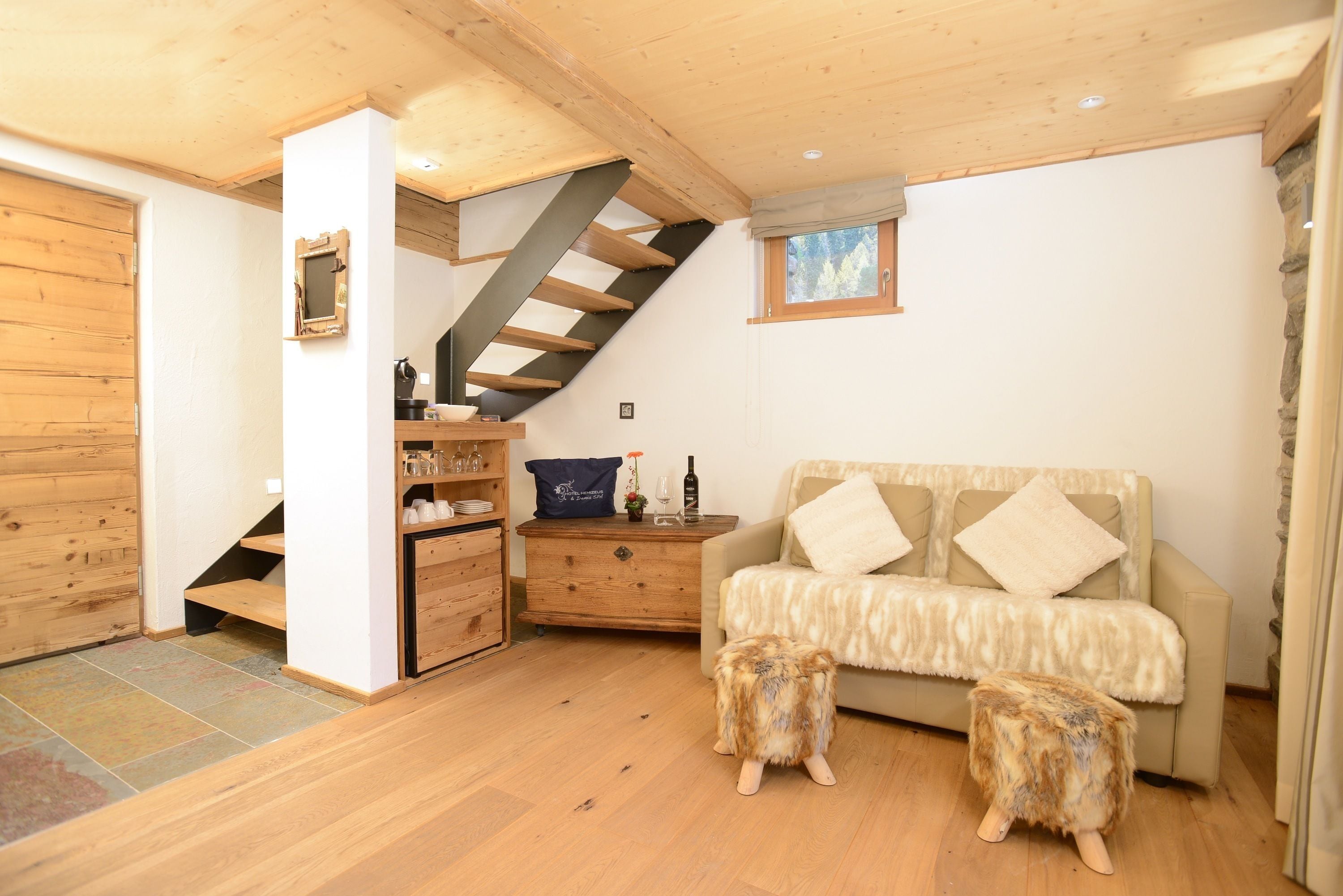 deluxe chalet, 1 bedroom, patio, mountain view | living room | flat-screen tv