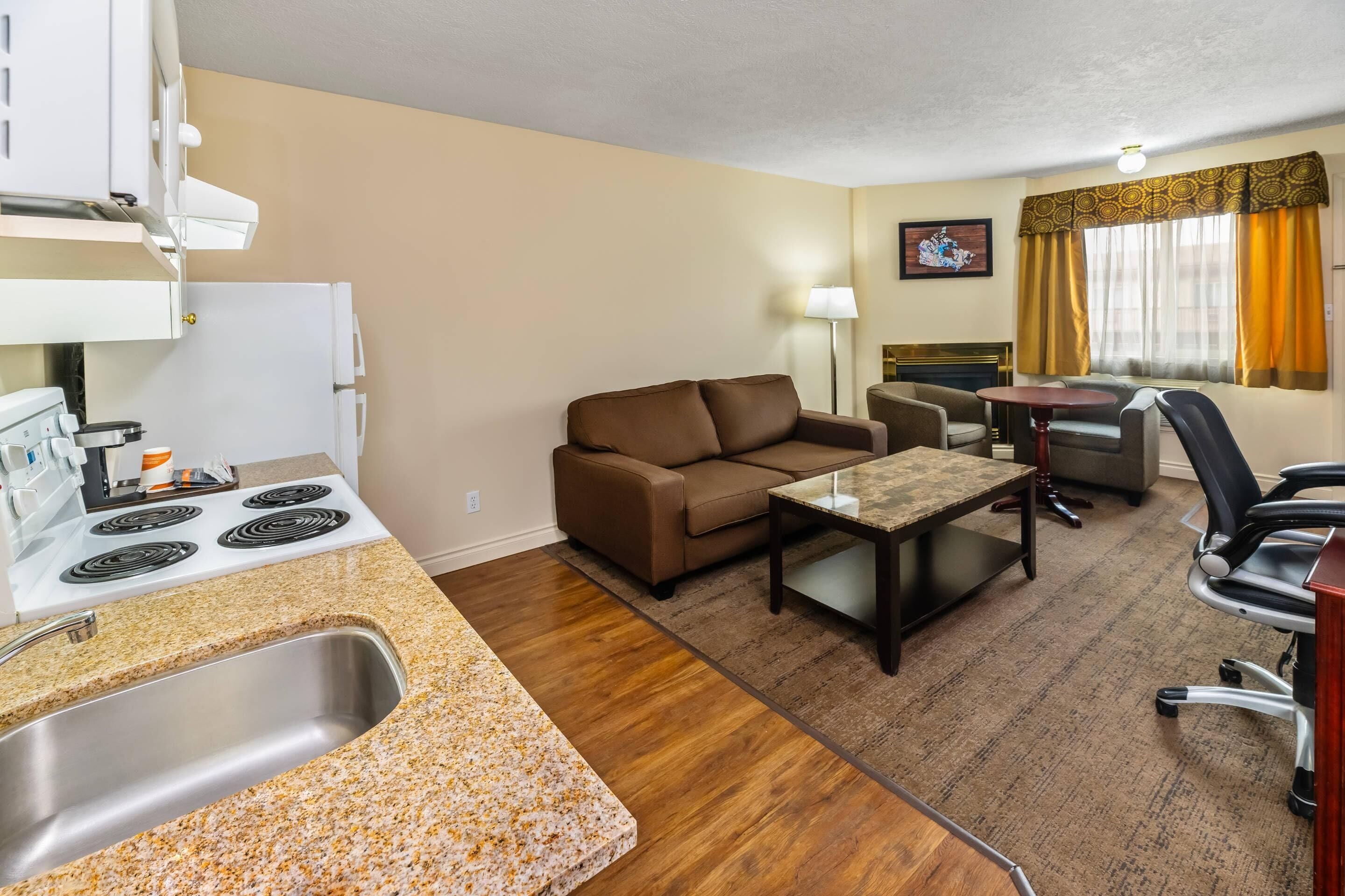 Suite, 1 Queen Bed, Non Smoking | Desk, iron/ironing board, WiFi, bed sheets