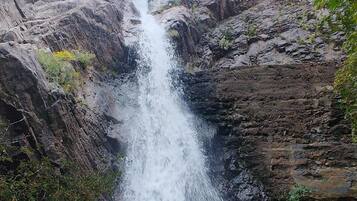 A waterfall cascading down a rocky gorge.