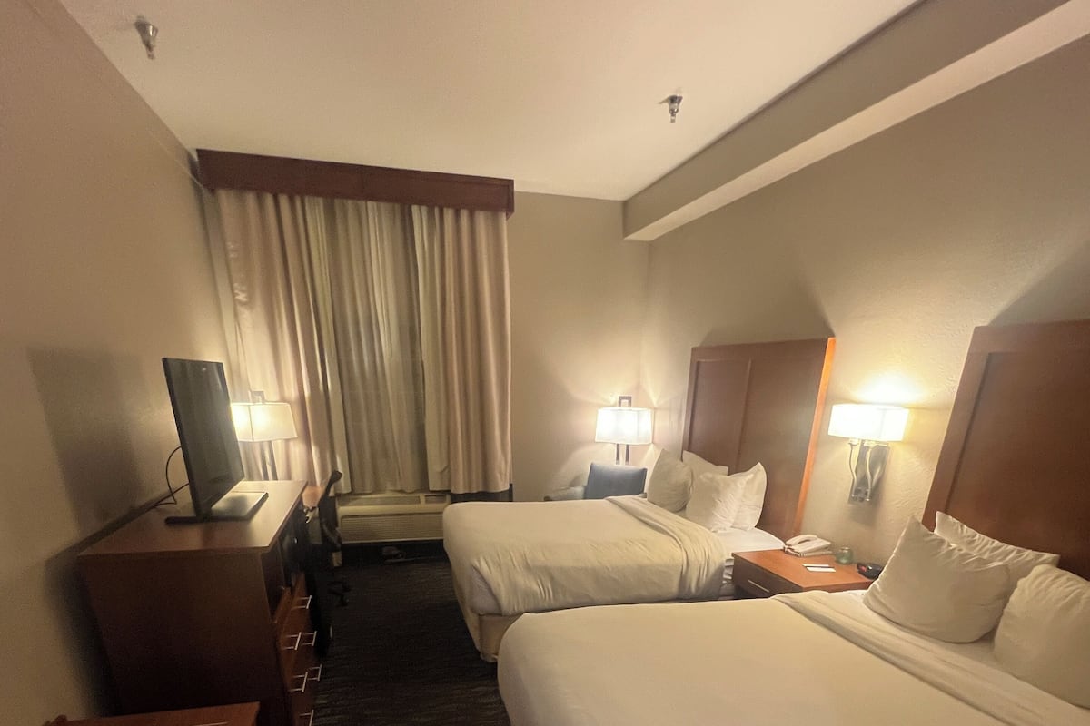 Standard Room, 2 Queen Beds, Non Smoking | Desk, blackout drapes, iron/ironing board, free cribs/infant beds