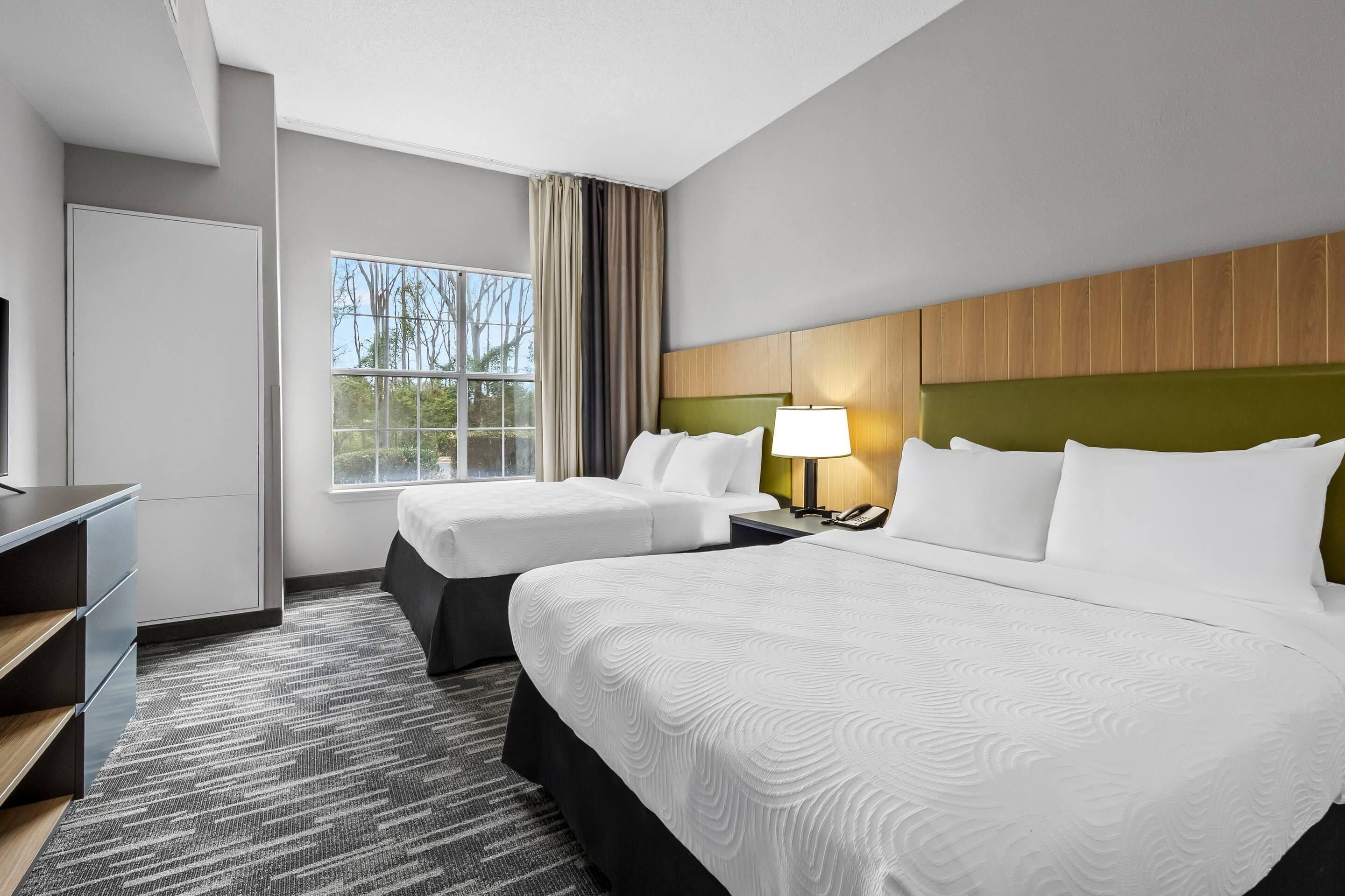 Suite, 1 Bedroom, Non Smoking | Down comforters, desk, iron/ironing board, cribs/infant beds