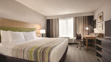 Habitación, 1 cama King size, para no fumadores | 1 habitación, escritorio y cortinas blackout