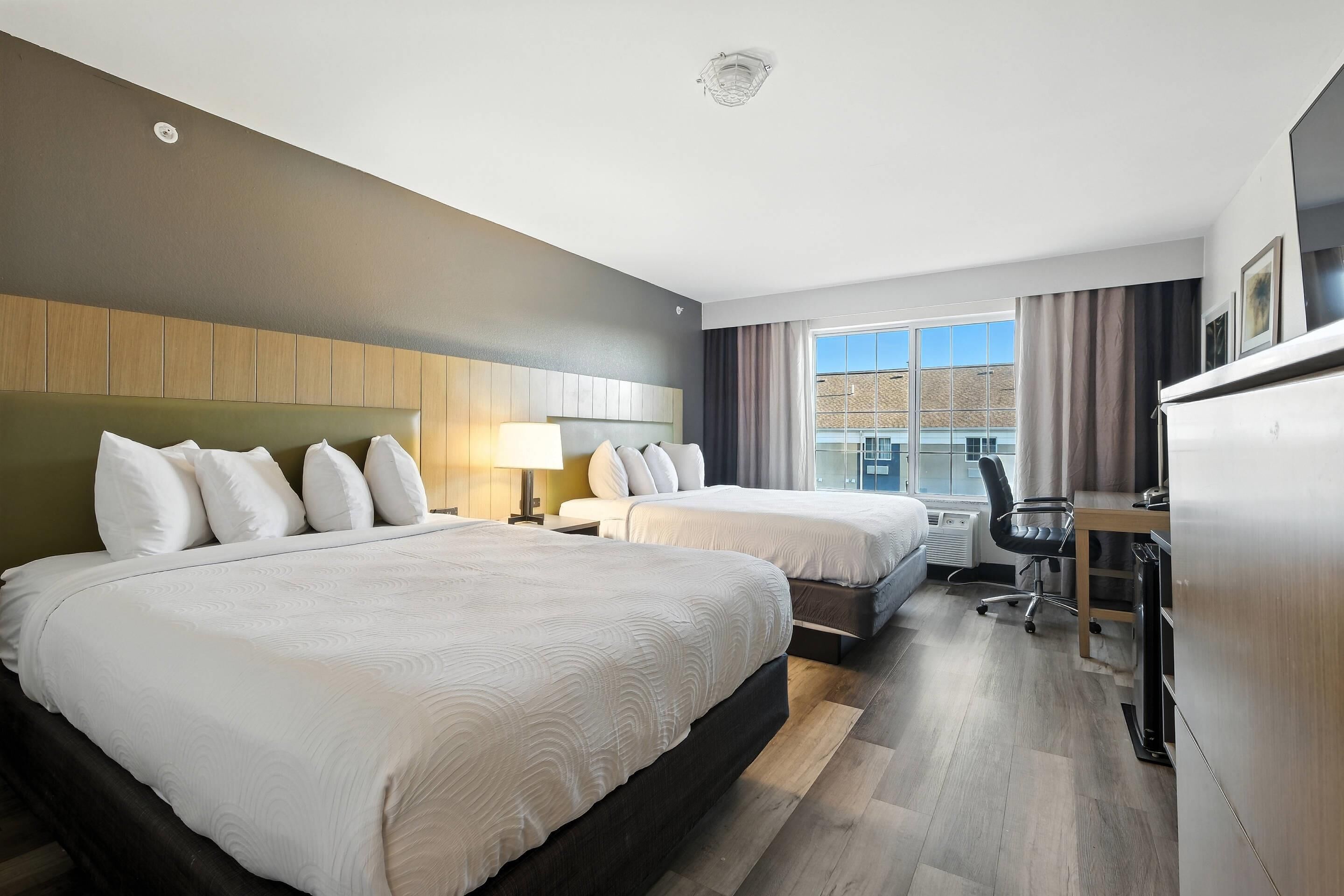 Room, 2 Queen Beds, Non Smoking | Desk, blackout drapes, iron/ironing board, free WiFi