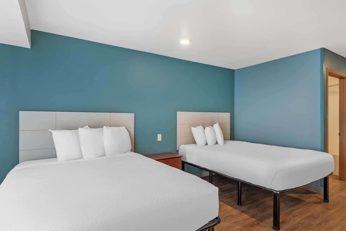 Desk, laptop workspace, free WiFi, bed sheets