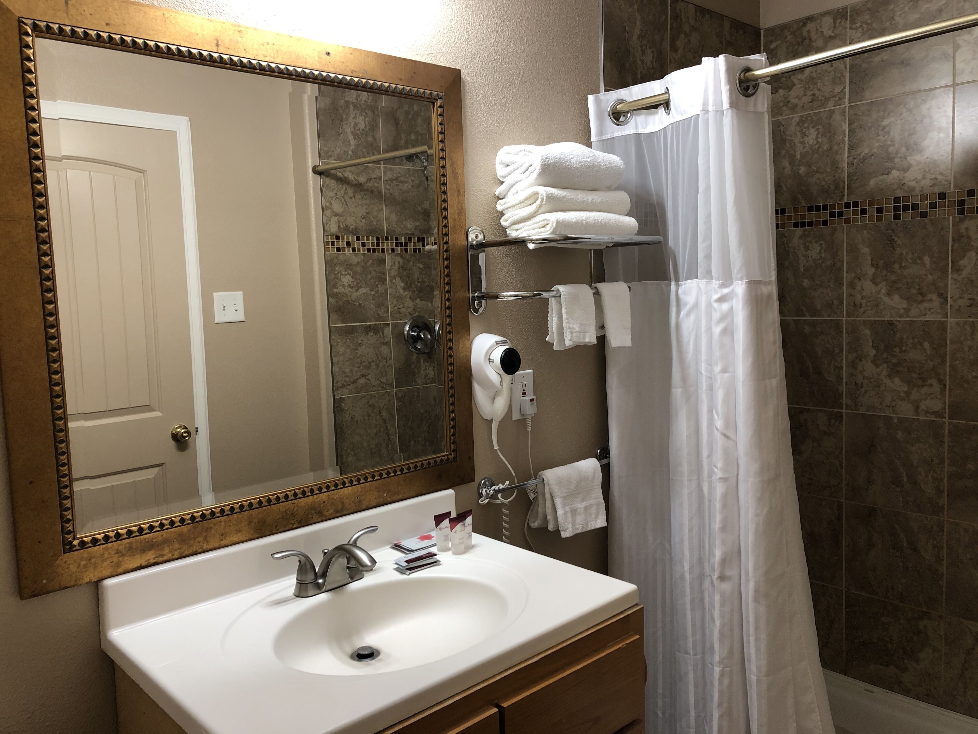 deluxe room, 1 king bed | bathroom sink